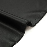 Crêpe de polyester satiné noir corbeau