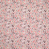 Coton imprimé ouragan floral rose fond blanc