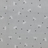 Piqué de coton imprimé pissenlit fond gris