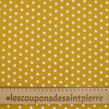 Fondo de mostaza de las estrellas estampadas de poplina de algodón