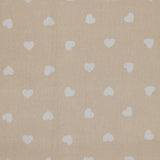 Piqué de coton imprimé cœur fond beige