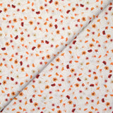 Coton imprimé au gré du vent orange fond blanc