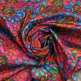 Coton imprimé rayon de soleil rose et bleu
