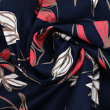 Satin de coton élasthanne imprimé expert du vent fond bleu foncé