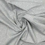 Piqué de coton imprimé pissenlit fond gris