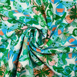 Viscose imprimée jacquard papillons bleus et verts fond blanc