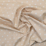 Piqué de coton imprimé cœur fond beige