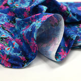 Coton imprimé bouquet flamboyant bleu fond noir