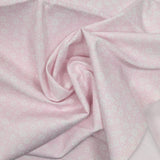 Piqué de coton imprimé fleurs printanière fond rose clair