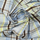 Coton imprimé à carreaux bleu, jaune et marron