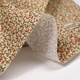 Coton imprimé s'épanouir vert, rouge et beige