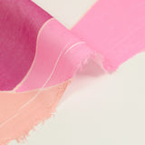 Voile de polycoton vague violette, rose et rouge fond blanc