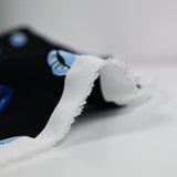 Satin viscose crepe blue mouth black background