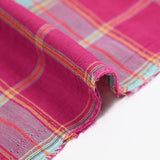 Coton tissé-teint carreaux lurex doré fond rose