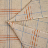 Woven cotton dyed sky and brown checks mottled beige background