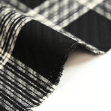 Jacquard de laine mélangée à carreaux écru fond noir