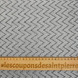 Dentelle polyester chevron gris fond argent