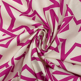 Popeline de coton imprimée étoiles en lien magenta fond blanc cassé