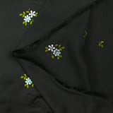 Satin de polyester brodé fleurs vert d'eau fond noir