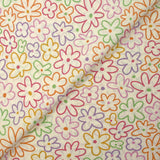 Coton imprimé contour de fleurs fond écru