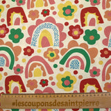 Coton imprimé arc-en-ciel et fleurs fond écru