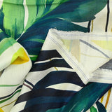 Voile de coton imprimé jungle vert fond blanc cassé