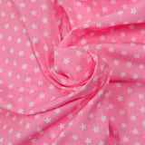 Coton imprimé étoile 1cm rose