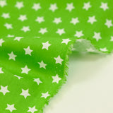 Coton imprimé étoile 1cm vert pistache