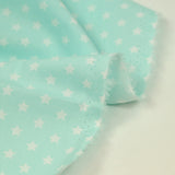 Coton imprimé étoile 1cm aqua