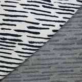 Jersey de coton tissé teint fantaisie marine fond blanc