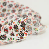 Coton imprimé Día de Muertos fond blanc