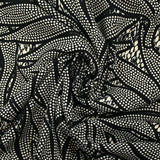 Twill de viscose imprimé nature en pointillés écru et noir