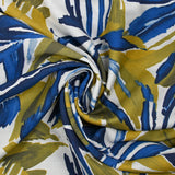 Crêpe viscose imprimé jungle anis et bleu fond blanc