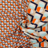 Viscose imprimée cercle vintage orange fond marine