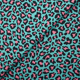 Coton imprimé léopard rose fond turquoise