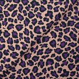 Coton imprimé léopard violet fond rose chair