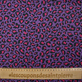 Coton imprimé léopard fuchsia fond violet
