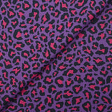 Coton imprimé léopard fuchsia fond violet