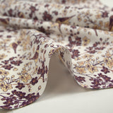 Coton imprimé envolée florale fond blanc cassé