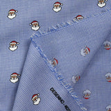 Coton tissé teint imprimé le père Noël fond blanc et bleu