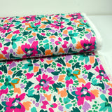 Coton imprimé Martina fleurs fantaisie fuchsia et vert au mètre