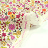 Coton imprimé Vittoria fleurs vintage fond écru au mètre