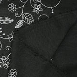 Twill de polyester brodé Solène fond noir