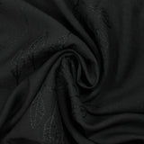 Crepe de viscosa Lily bordado follaje negro