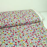 Coton imprimé Aurora fleurs rouge et jaune fond blanc au mètre