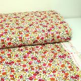 Cotton printed Greta Flowers Fuchsia and Orange White background per meter