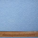 Popeline polycoton imprimée carreaux en pointillisme fond bleu chiné