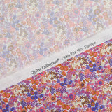 Coton imprimé Matilde fleurs corail et lavande au mètre