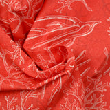 Polycoton imprimé corail fond orange