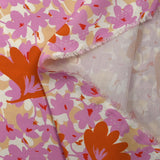 Viscose imprimée ombre florale parme et orange fond beige